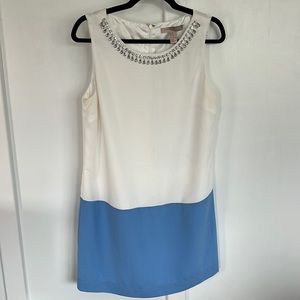 White and blue dress with diamond neckline